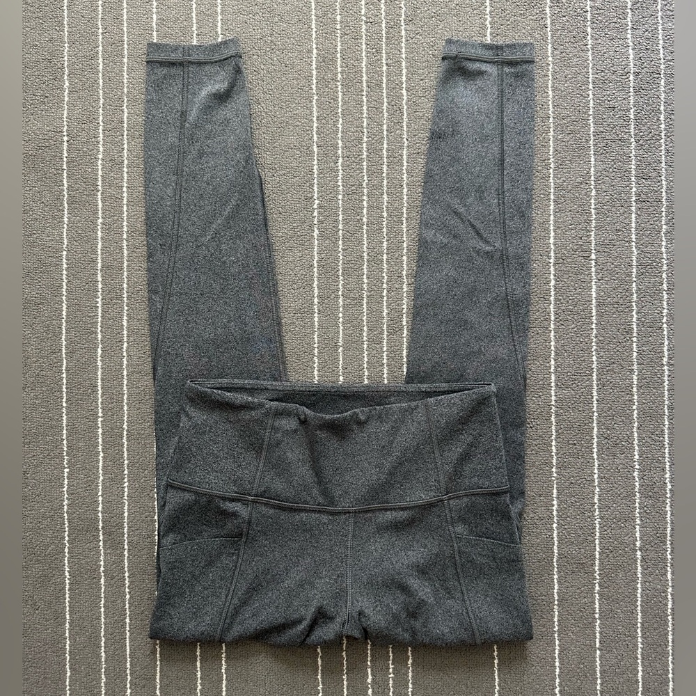 Athleta Stash Pocket Salutation Tight